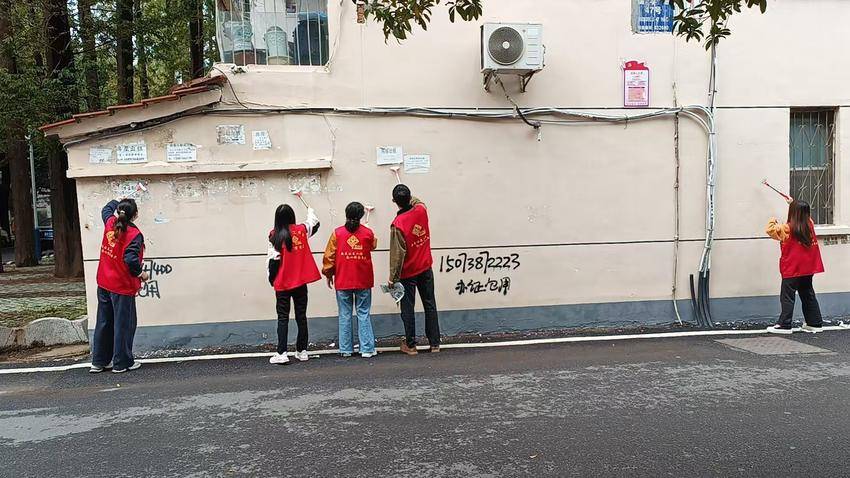 安陆市府城街道儒学社区：向“牛皮癣”宣战，为家园“换新颜”.doc