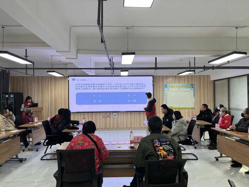 青山区组织开展丰富多彩“国际残疾人日”活动.doc