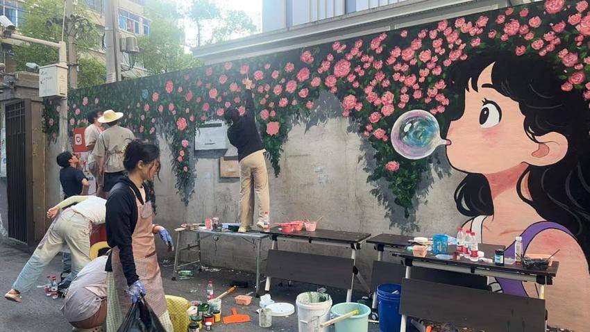 艺术邂逅社区，旧墙披上“新衣裳”.docx