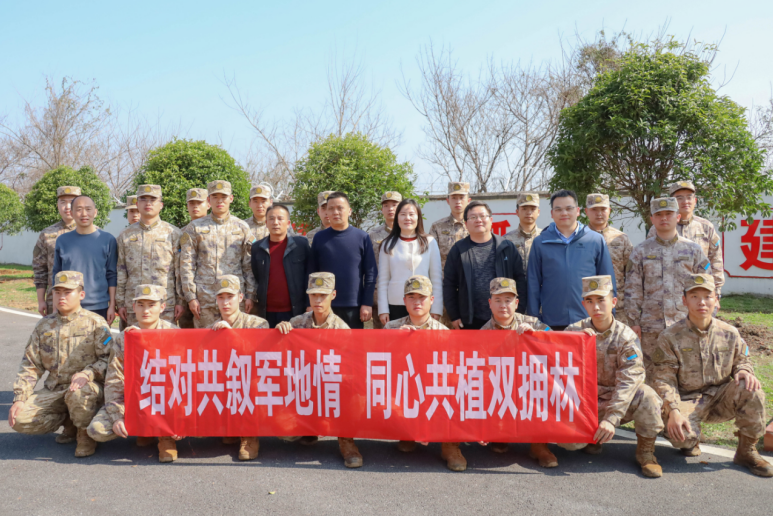 结对共叙军地情 同心共植双拥林